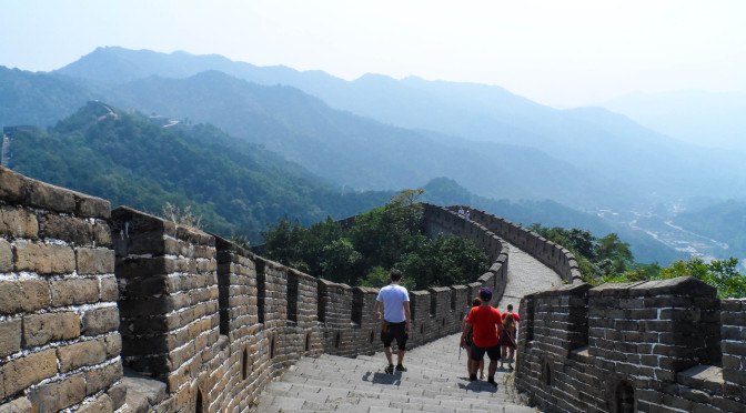 two person walking in the Great Wall of china