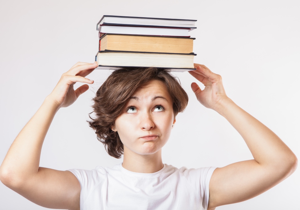 girl with books on her head